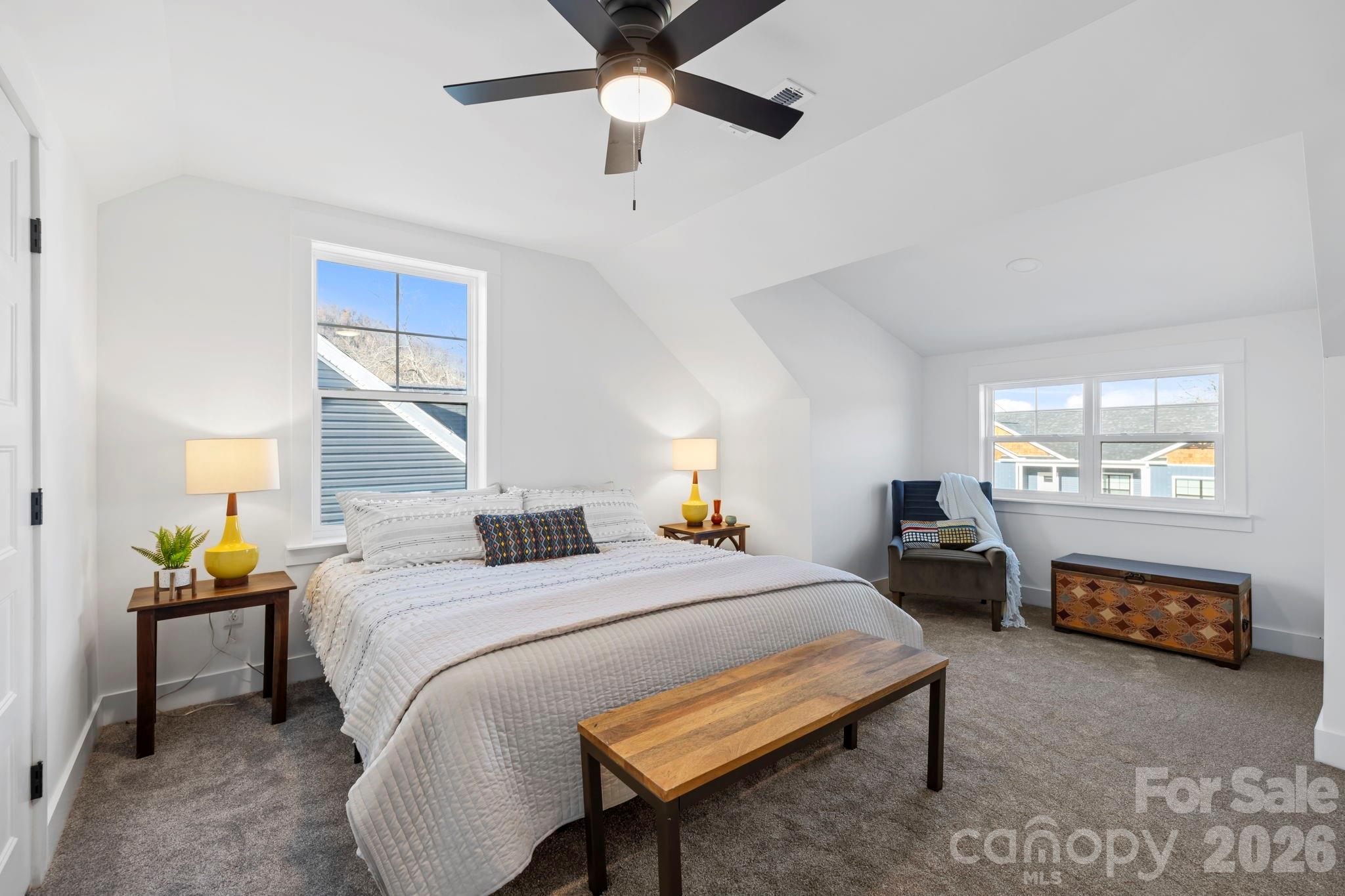 205 Southern Charm Road Arden, NC 28704 - Photo 28 of 34 a bedroom with a bed and a window