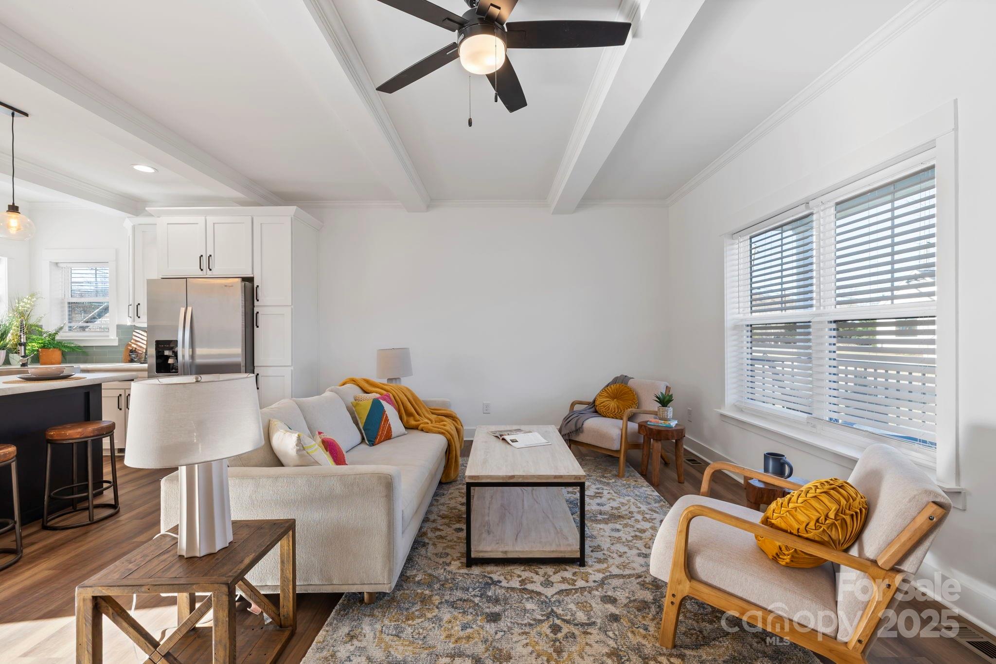 205 Southern Charm Road Arden, NC 28704 - Photo 5 of 26 a living room with furniture and a window