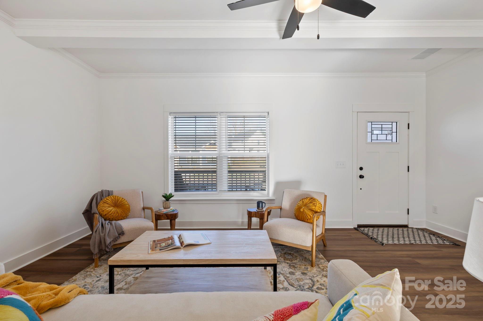 205 Southern Charm Road Arden, NC 28704 - Photo 7 of 26 a living room with furniture and a window