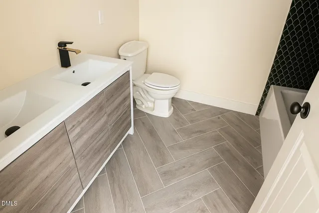 a view of a hallway with a window