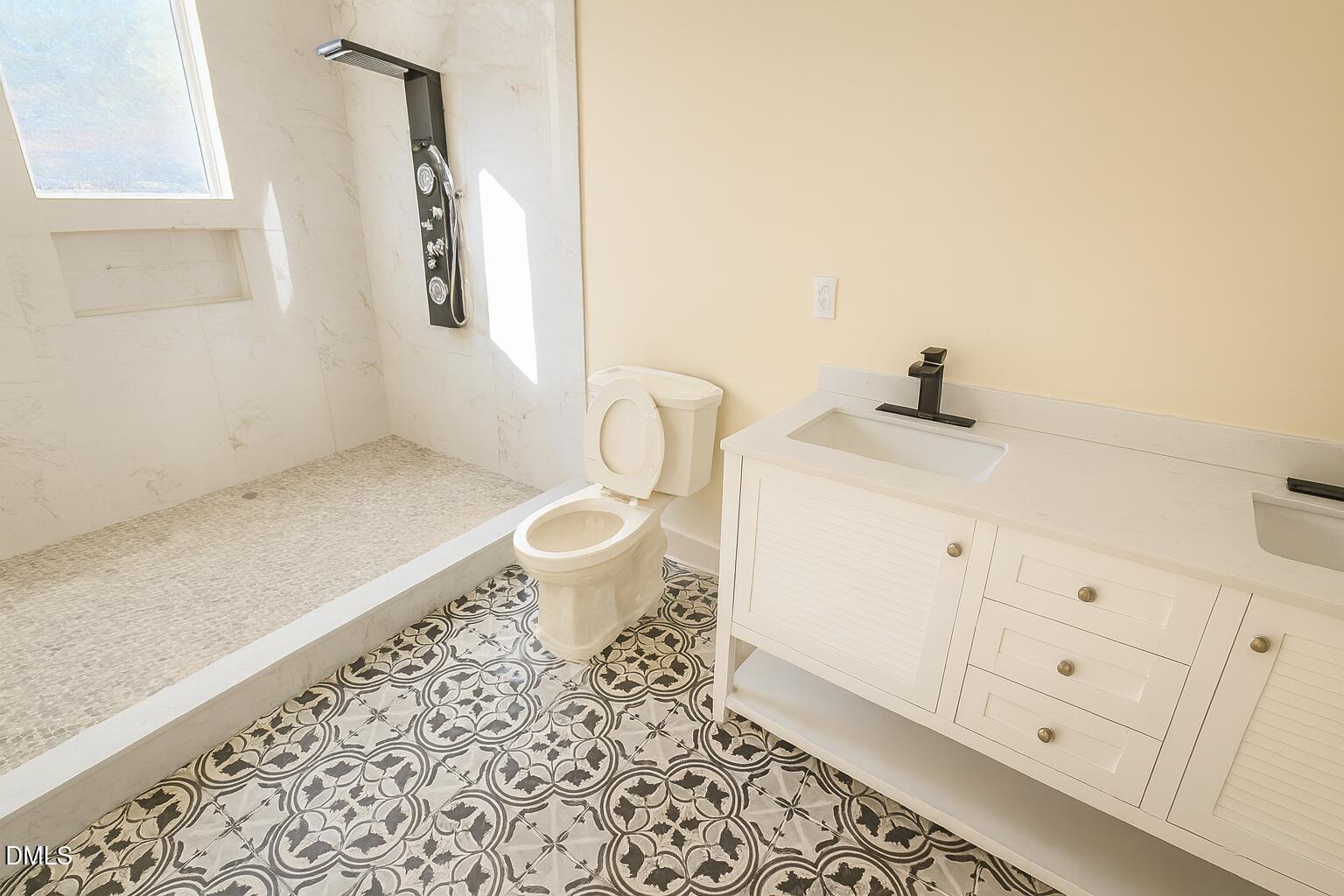 415 Gwen Road Hillsborough, NC 27278 - Photo 9 of 21 a bathroom with a granite countertop sink and a mirror