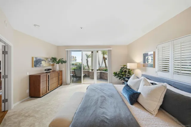 a couple of potted plants in front of a house