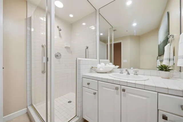 a view of a hallway with toilet and entryway