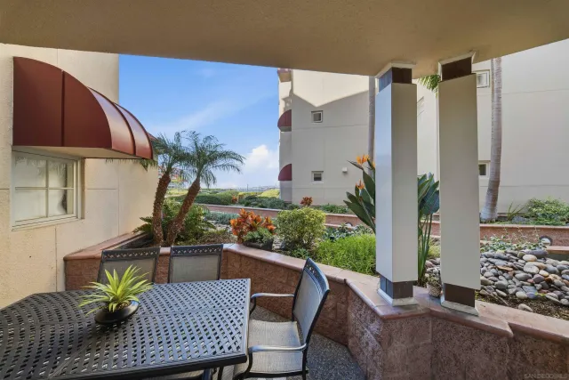 a view of balcony with furniture