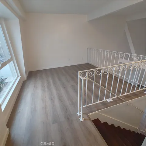 a view of a garden in front of a house