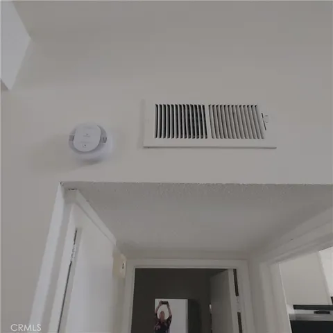 a view of house with backyard porch and outdoor seating