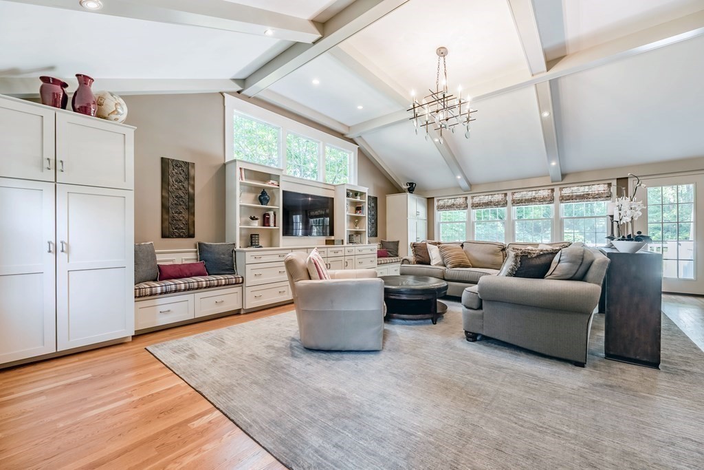 1 Rennie Drive Andover, MA 01810 - Photo 13 of 39 a living room with furniture and a chandelier