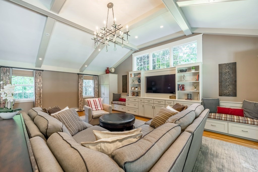 1 Rennie Drive Andover, MA 01810 - Photo 15 of 39 a living room with furniture and a flat screen tv