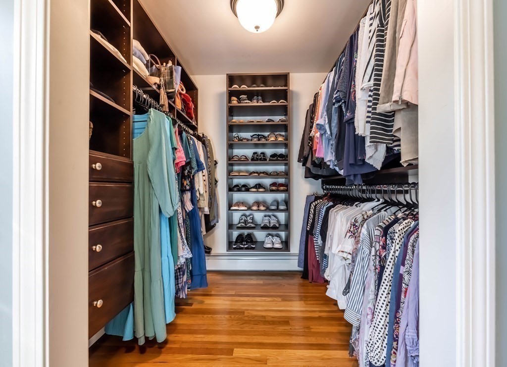 1 Rennie Drive Andover, MA 01810 - Photo 23 of 39 a view of walk in closet with clothes and shoes