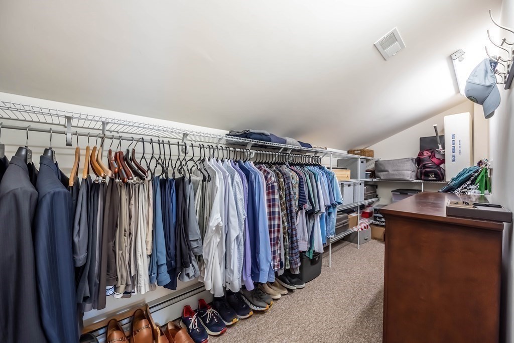 1 Rennie Drive Andover, MA 01810 - Photo 24 of 39 a view of walk in closet with clothes and shoes