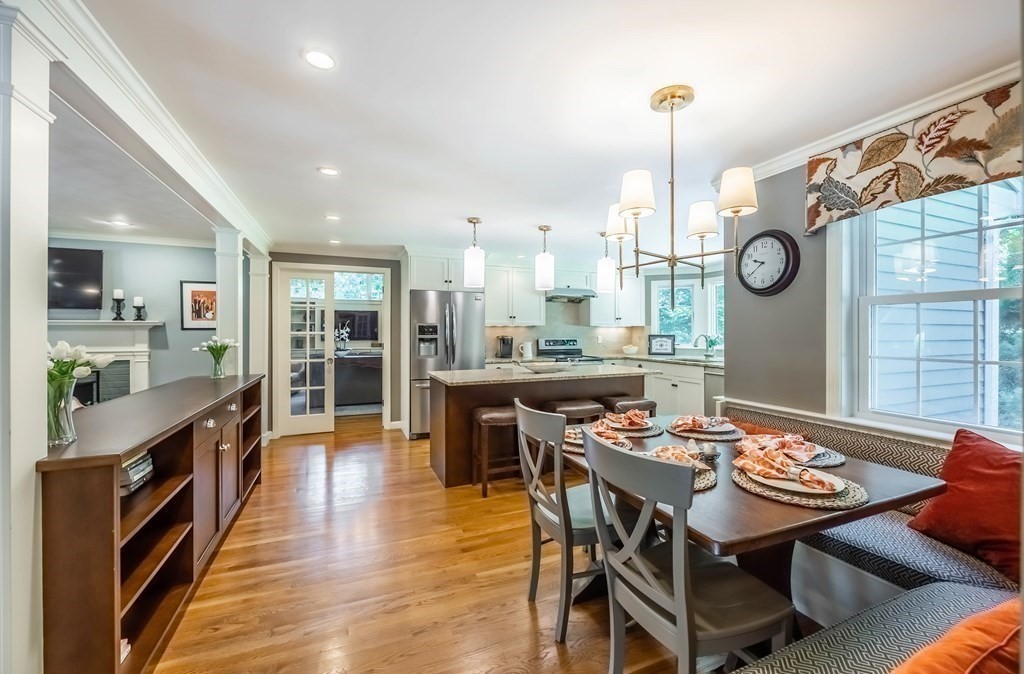 1 Rennie Drive Andover, MA 01810 - Photo 9 of 39 a large kitchen with a table and chairs