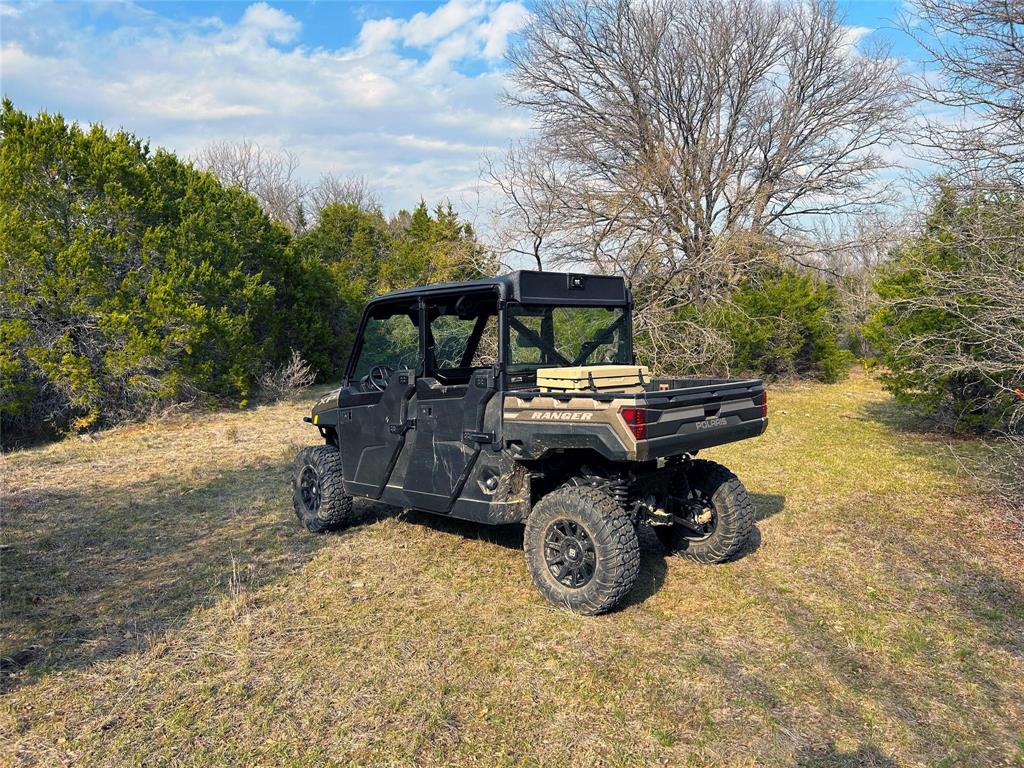 471 County Road 471 Strawn, TX 76475 - Photo 8 of 23 a car parked on the side of the road