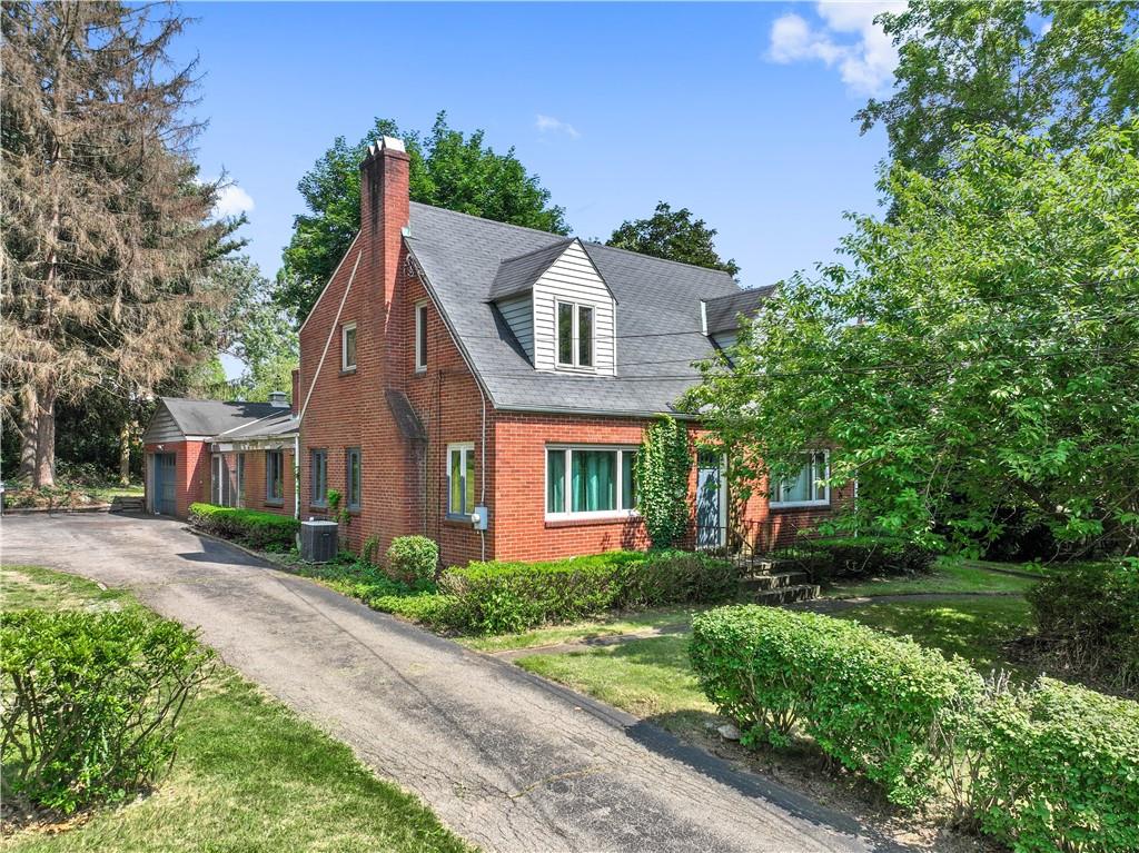 720 Perry Highway Pittsburgh, PA 15229 - Photo 1 of 39 front view of a house with a yard