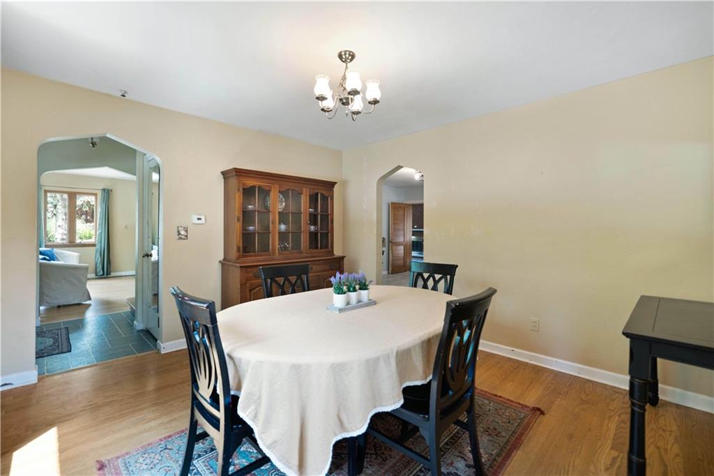 720 Perry Highway Pittsburgh, PA 15229 - Photo 11 of 39 a view of a dining room with furniture and wooden floor