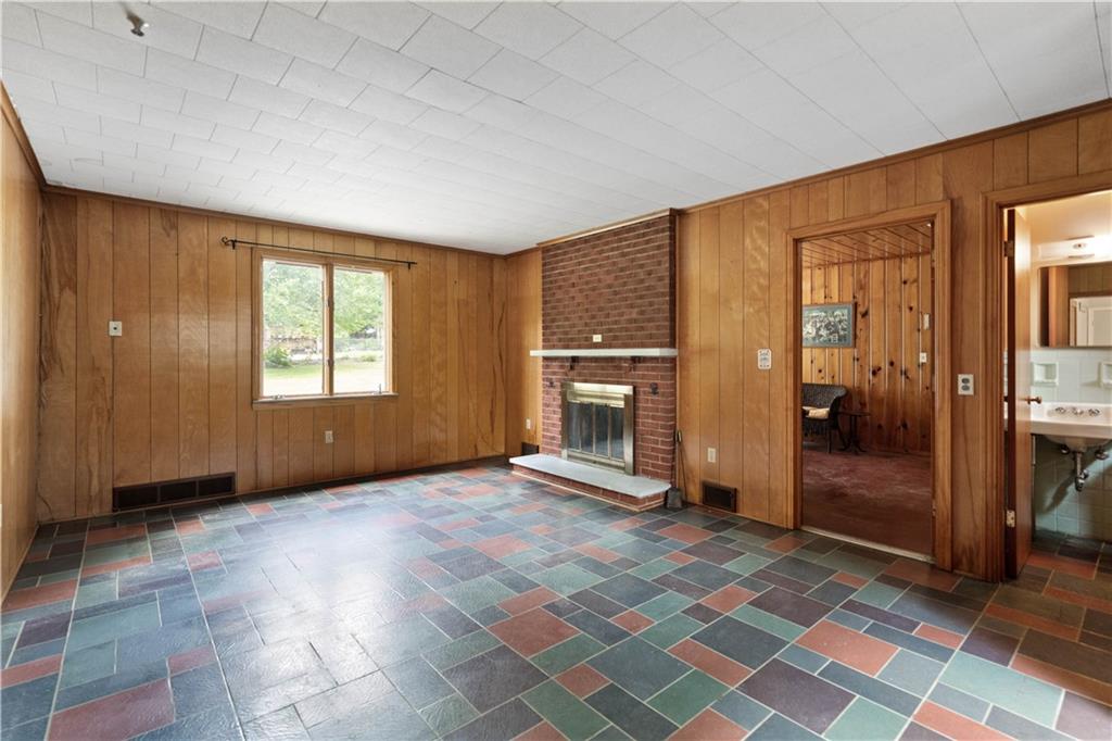 720 Perry Highway Pittsburgh, PA 15229 - Photo 19 of 39 a view of an empty room with a fireplace and a window