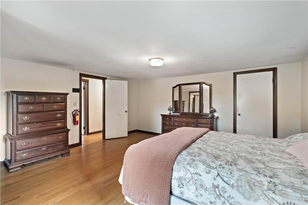 720 Perry Highway Pittsburgh, PA 15229 - Photo 30 of 39 a bedroom with a bed and a dresser