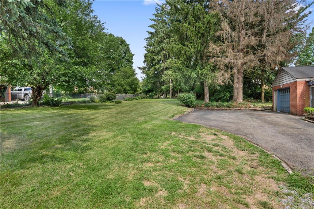 720 Perry Highway Pittsburgh, PA 15229 - Photo 3 of 39 a backyard of a house with lots of green space