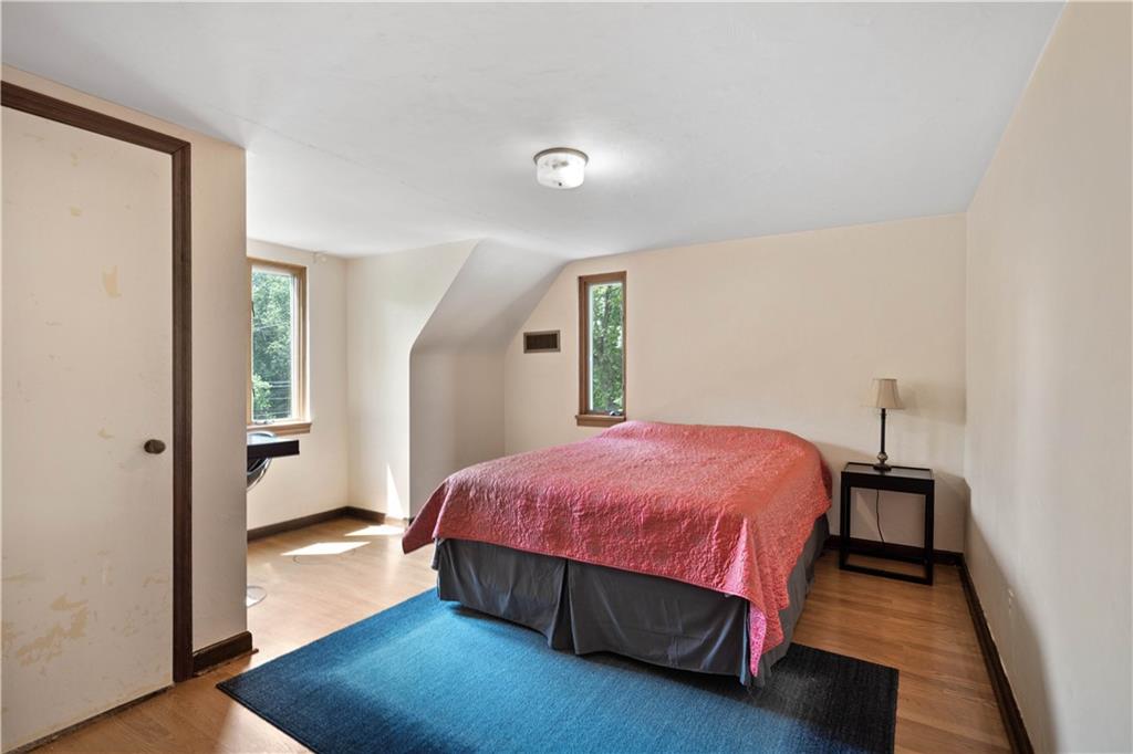 720 Perry Highway Pittsburgh, PA 15229 - Photo 32 of 39 a bedroom with a bed and a table