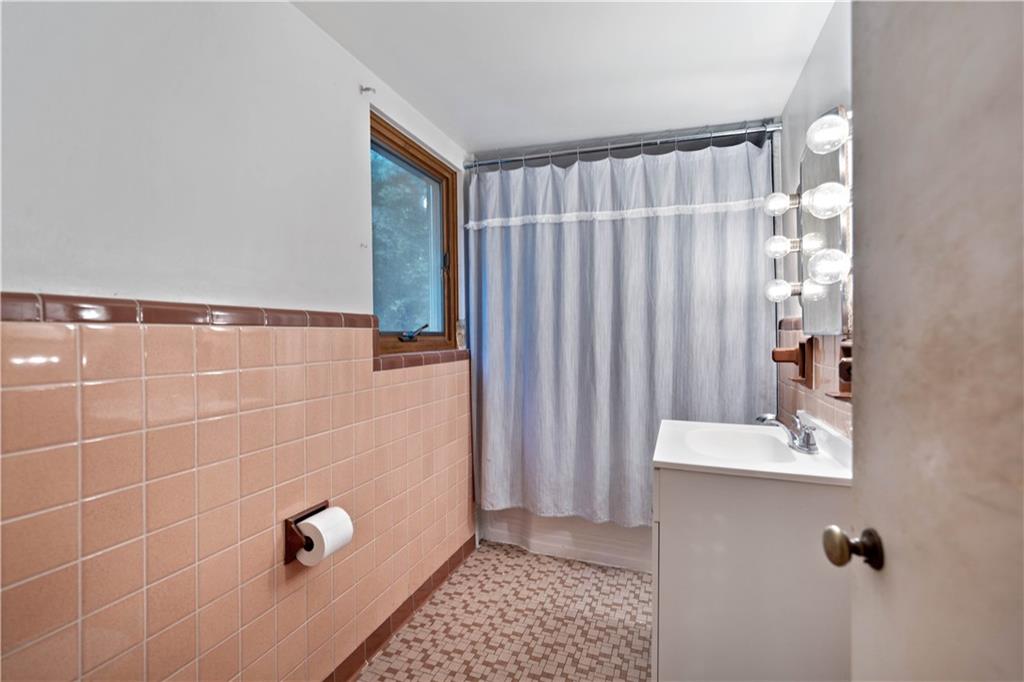 720 Perry Highway Pittsburgh, PA 15229 - Photo 36 of 39 a bathroom with a shower