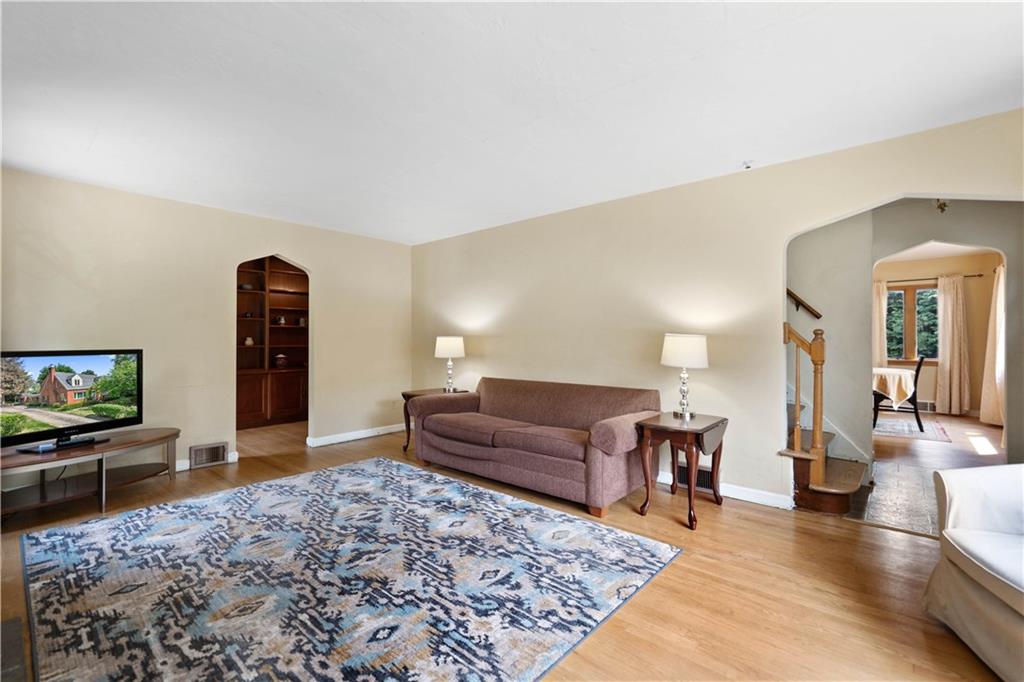 720 Perry Highway Pittsburgh, PA 15229 - Photo 7 of 39 a living room with furniture and a flat screen tv