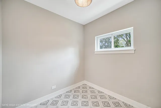 an empty room with window