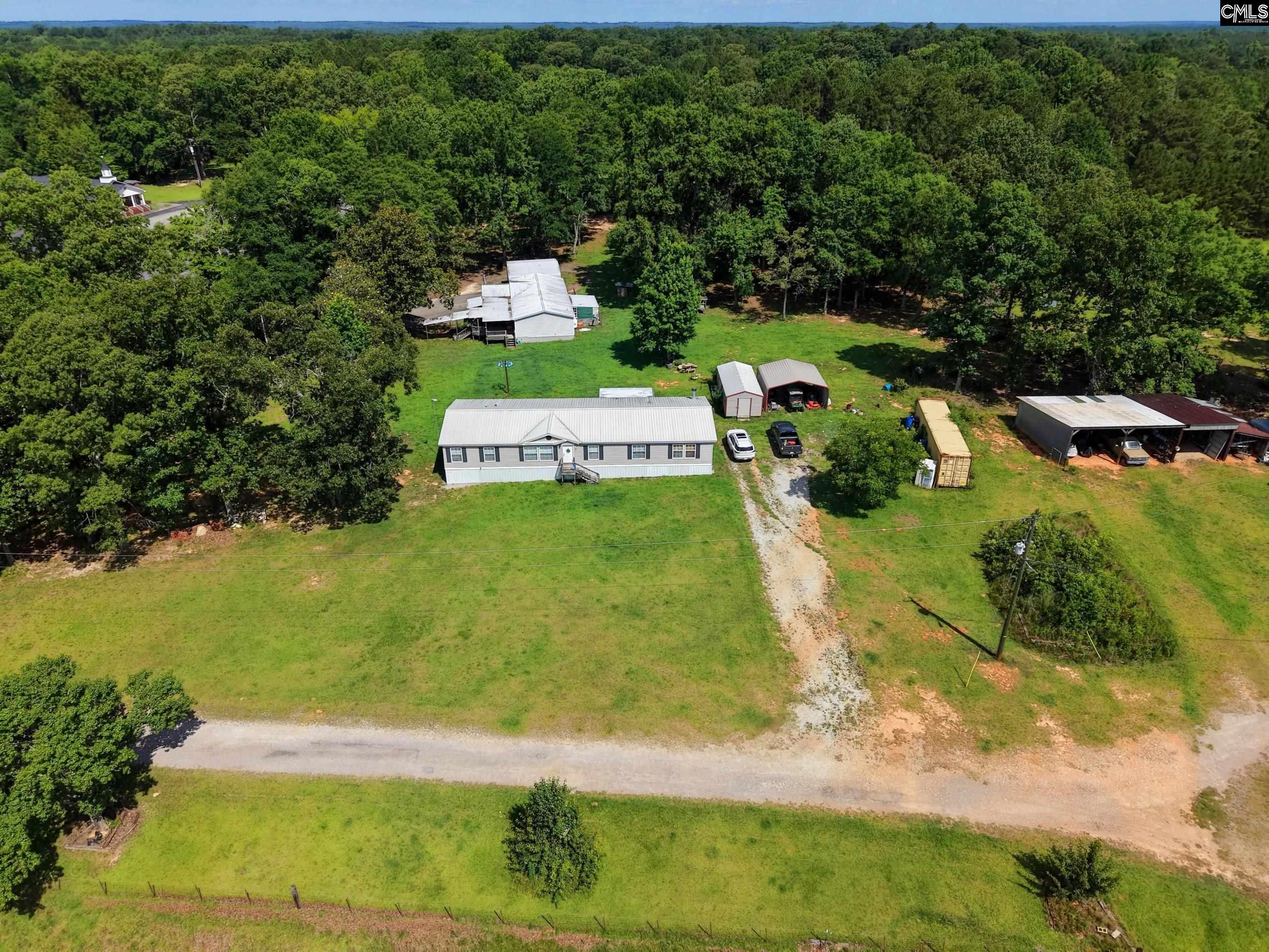 3140 Highway 702 Chappells, SC 29037 - Photo 5 of 39 a view of a park with large trees