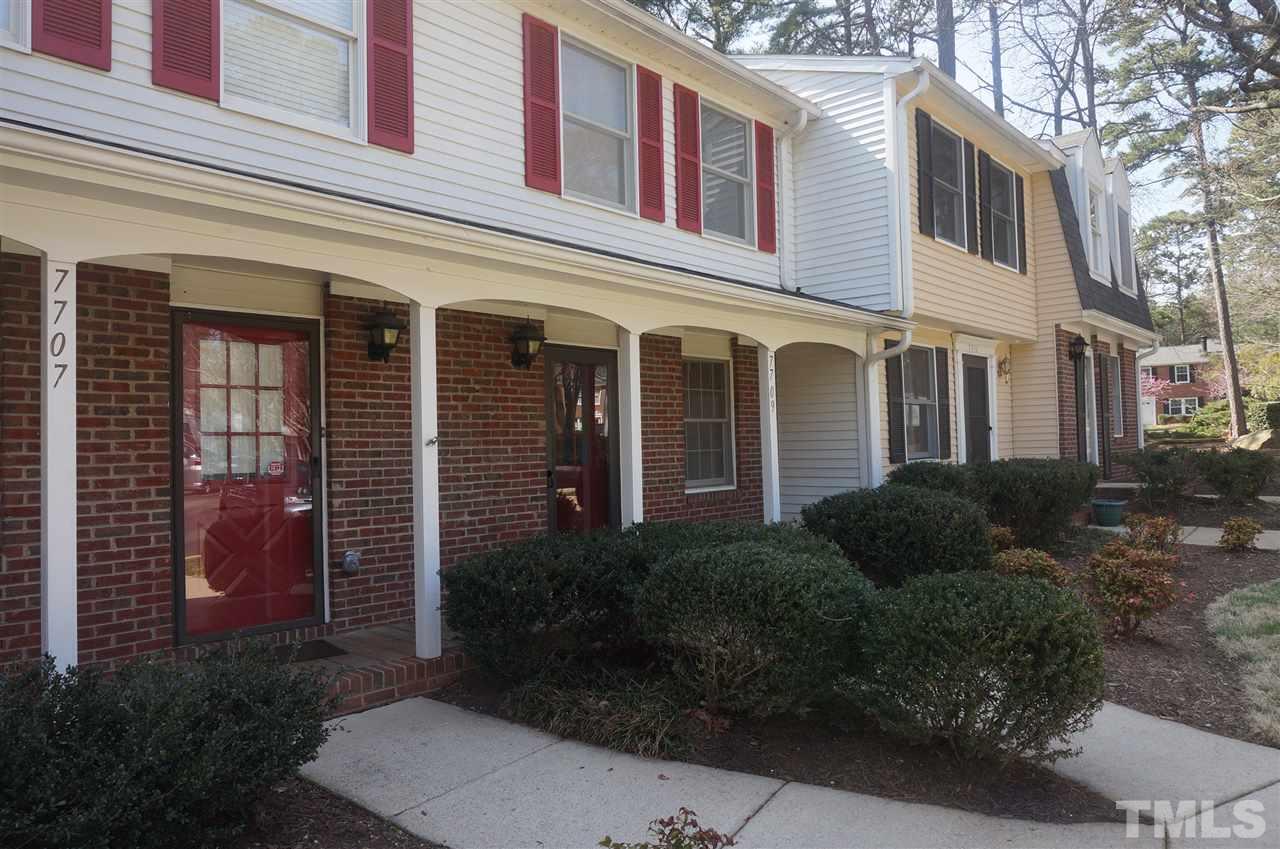7709 Crown Crest Court Raleigh, NC 27615 - Photo 2 of 21 a view of a house with a garden