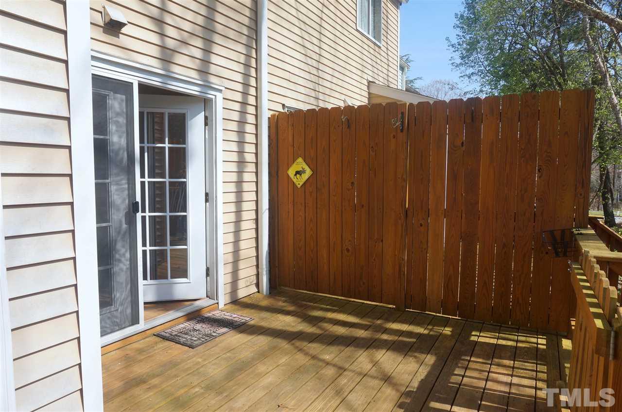 7709 Crown Crest Court Raleigh, NC 27615 - Photo 17 of 21 a view of a house with a backyard