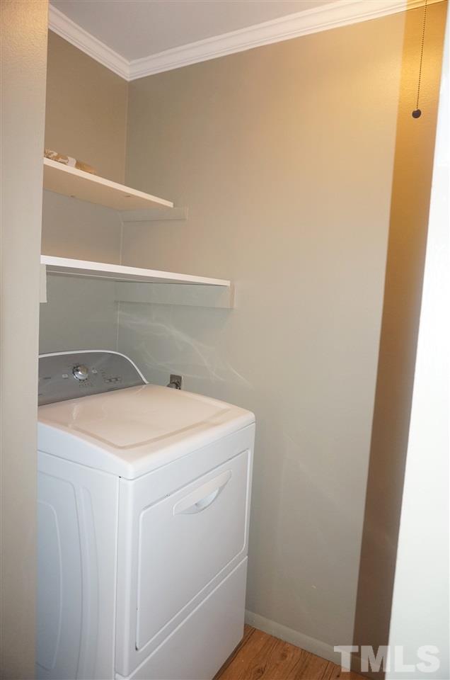 7709 Crown Crest Court Raleigh, NC 27615 - Photo 20 of 21 a utility room with dryer and washer