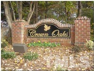 7709 Crown Crest Court Raleigh, NC 27615 - Photo 3 of 21 a sign broad in front of a building