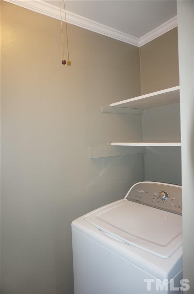 7709 Crown Crest Court Raleigh, NC 27615 - Photo 21 of 21 a utility room with a fan