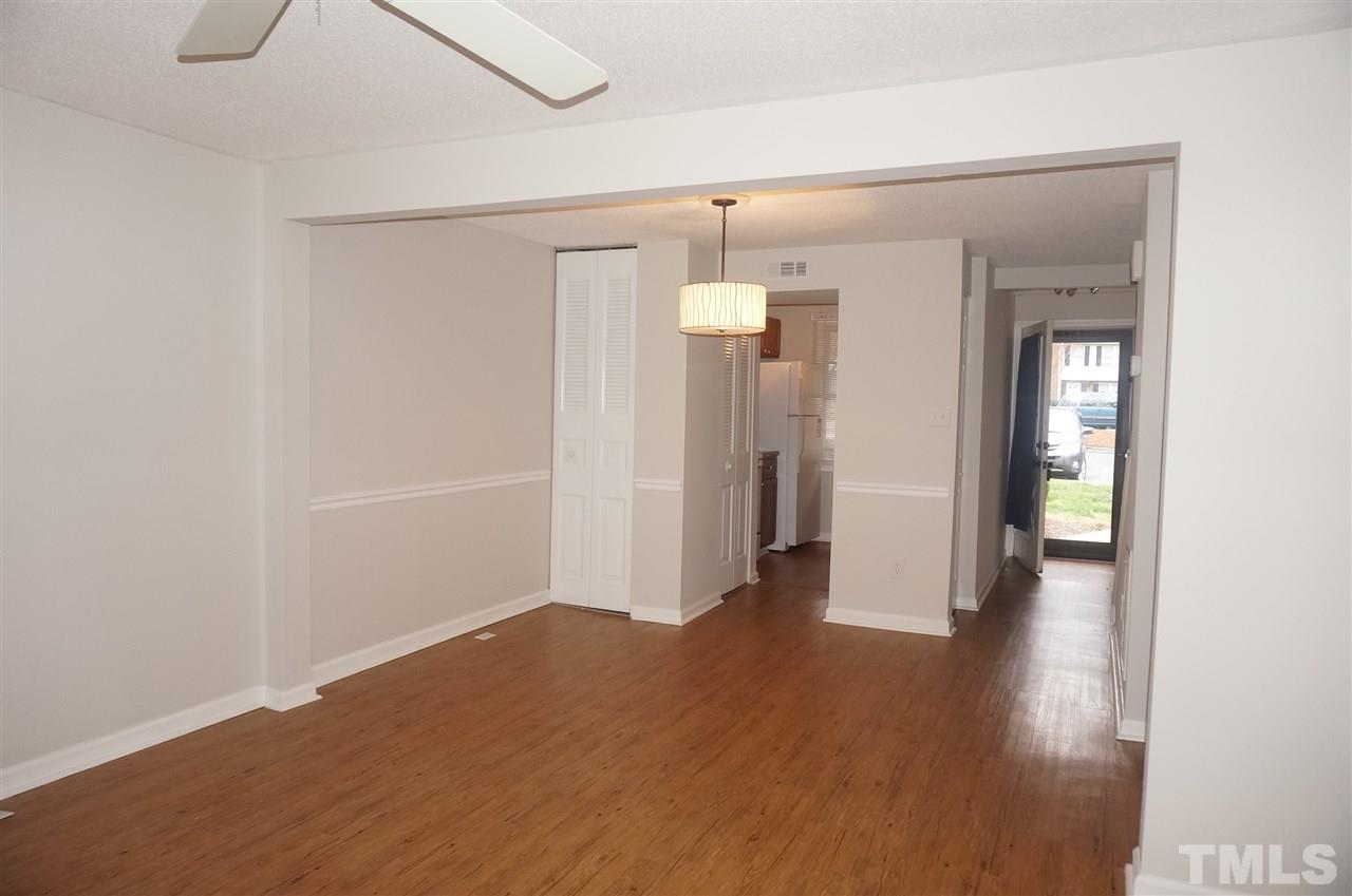 7709 Crown Crest Court Raleigh, NC 27615 - Photo 10 of 21 a view of a room with wooden floor