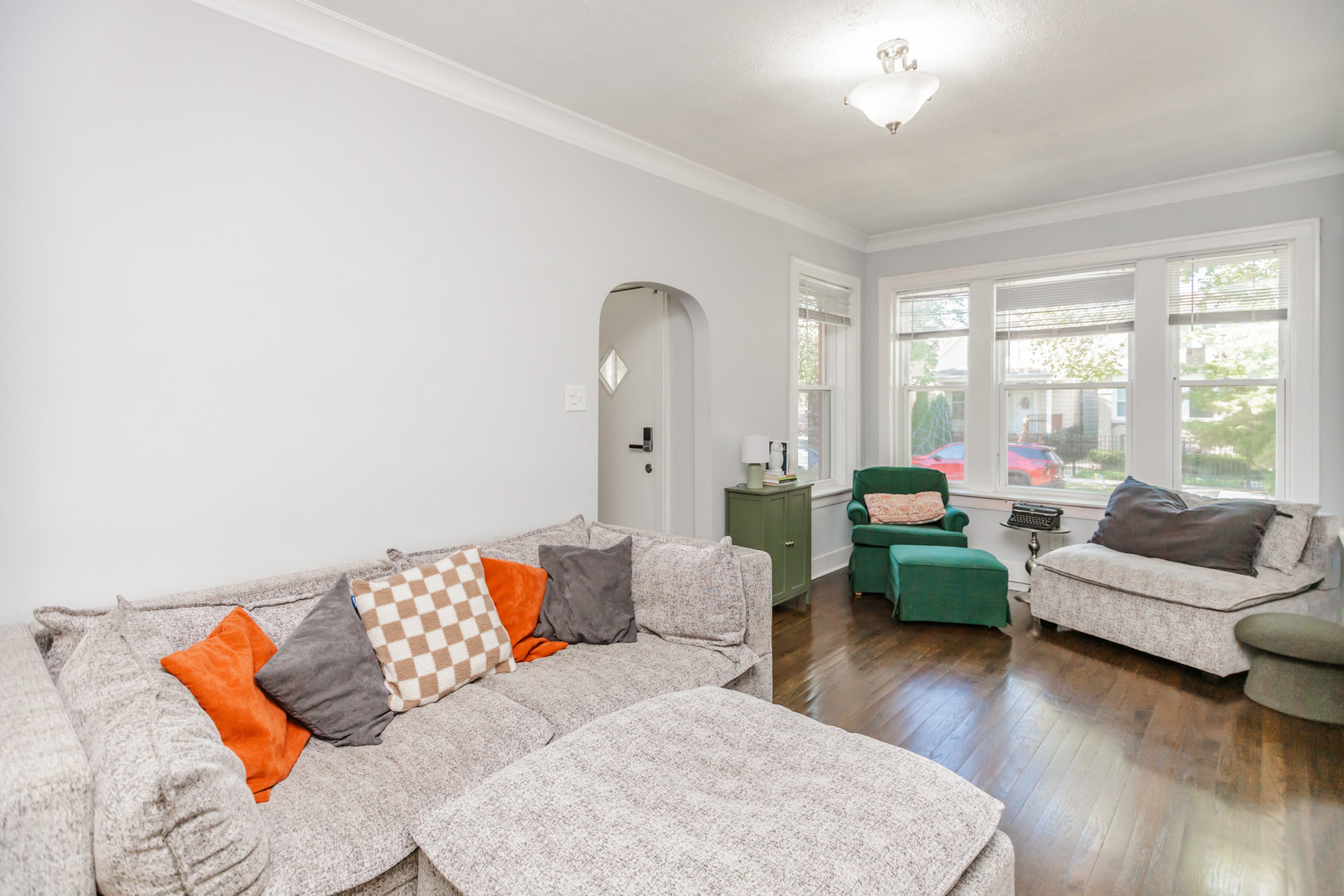 6339 South Troy Street Chicago, IL 60629 - Photo 2 of 19 a living room with furniture and a large window