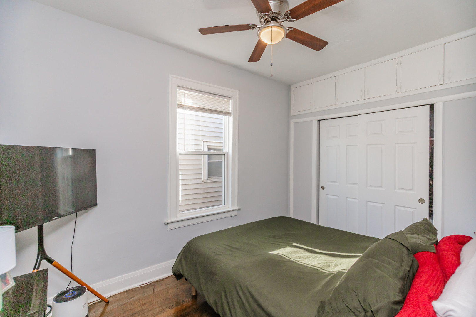 6339 South Troy Street Chicago, IL 60629 - Photo 6 of 19 a bedroom with a bed and a window