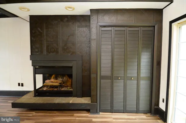 a living room with a fireplace