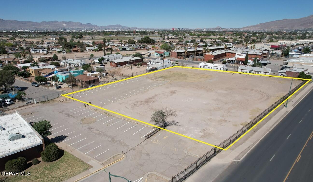 7064 Alameda El Paso, TX 79915 - Photo 4 of 6 an aerial view of residential houses with outdoor space
