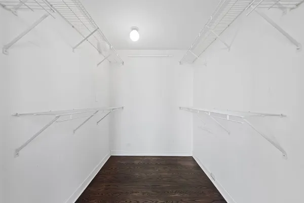 a view of an empty walk in closet