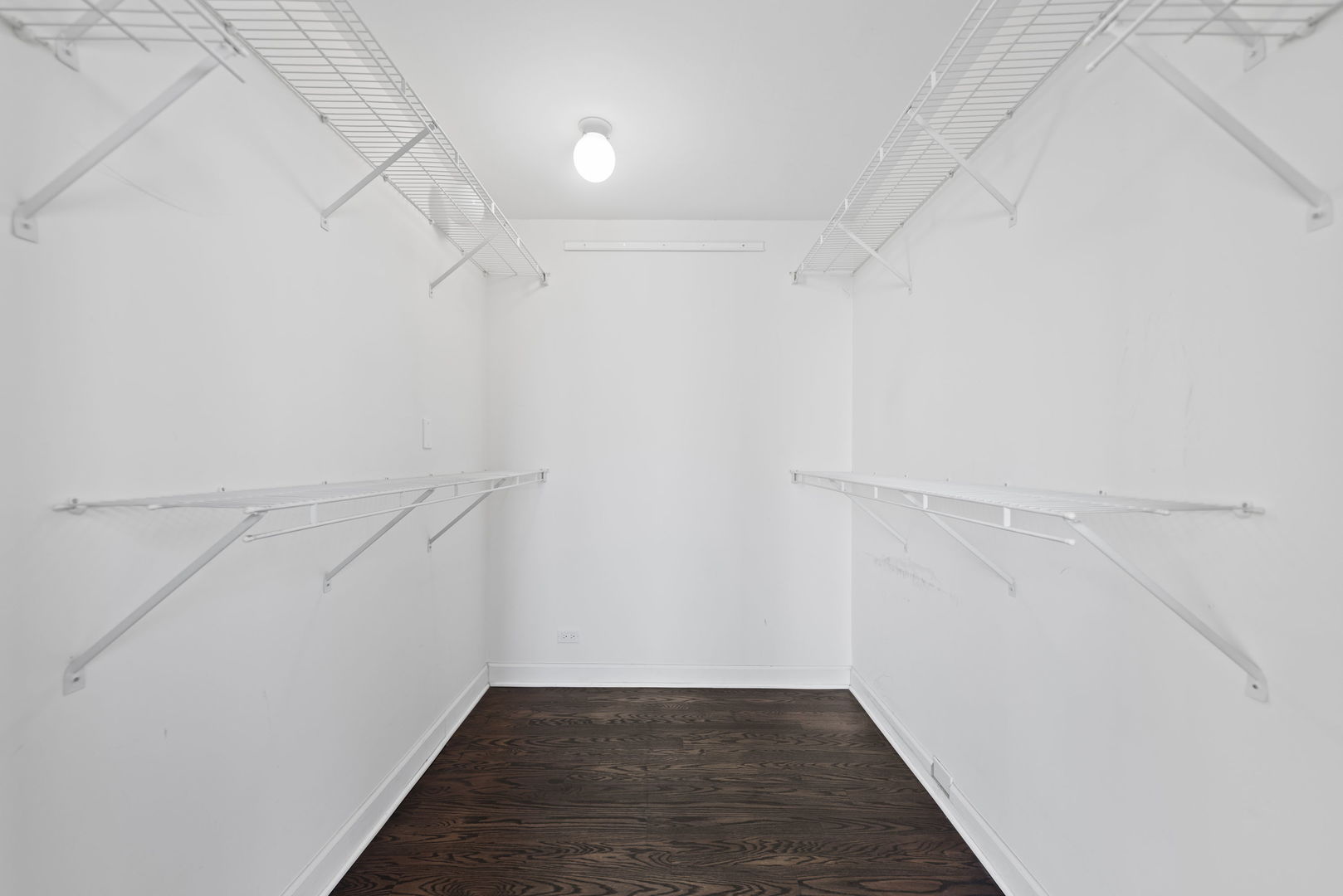 111 East Chestnut Street, Unit 30C Chicago, IL 60611 - Photo 14 of 27 a view of an empty walk in closet