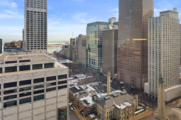 a view of a city with tall buildings