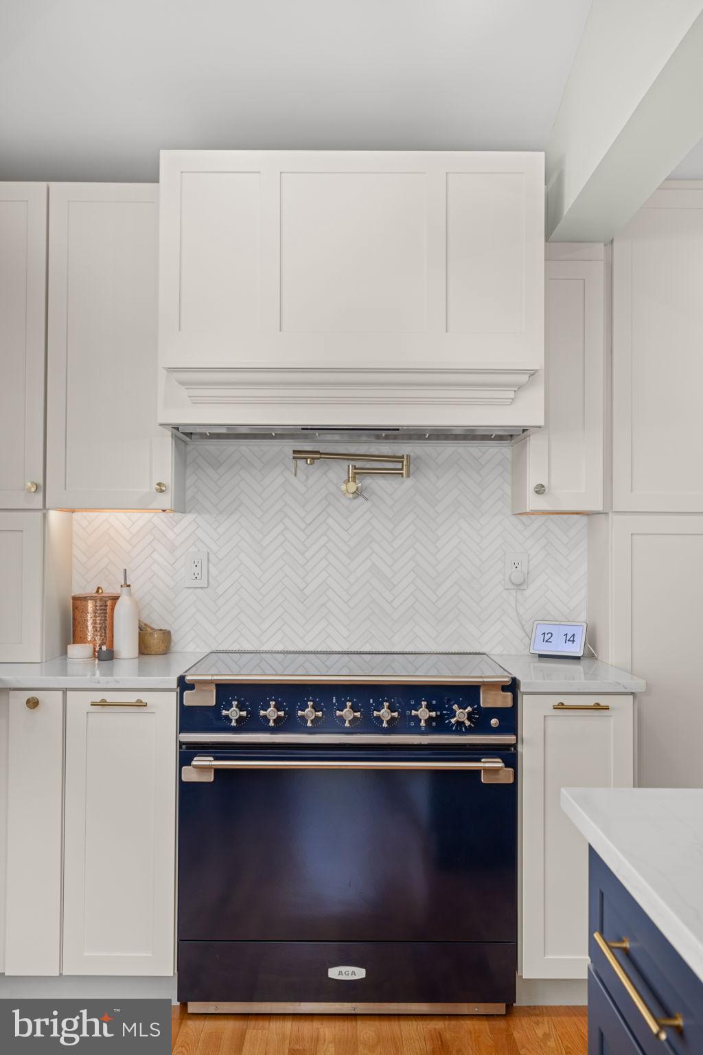 1138 Mayo Road Edgewater, MD 21037 - Photo 12 of 51 a stove top oven sitting inside of a kitchen