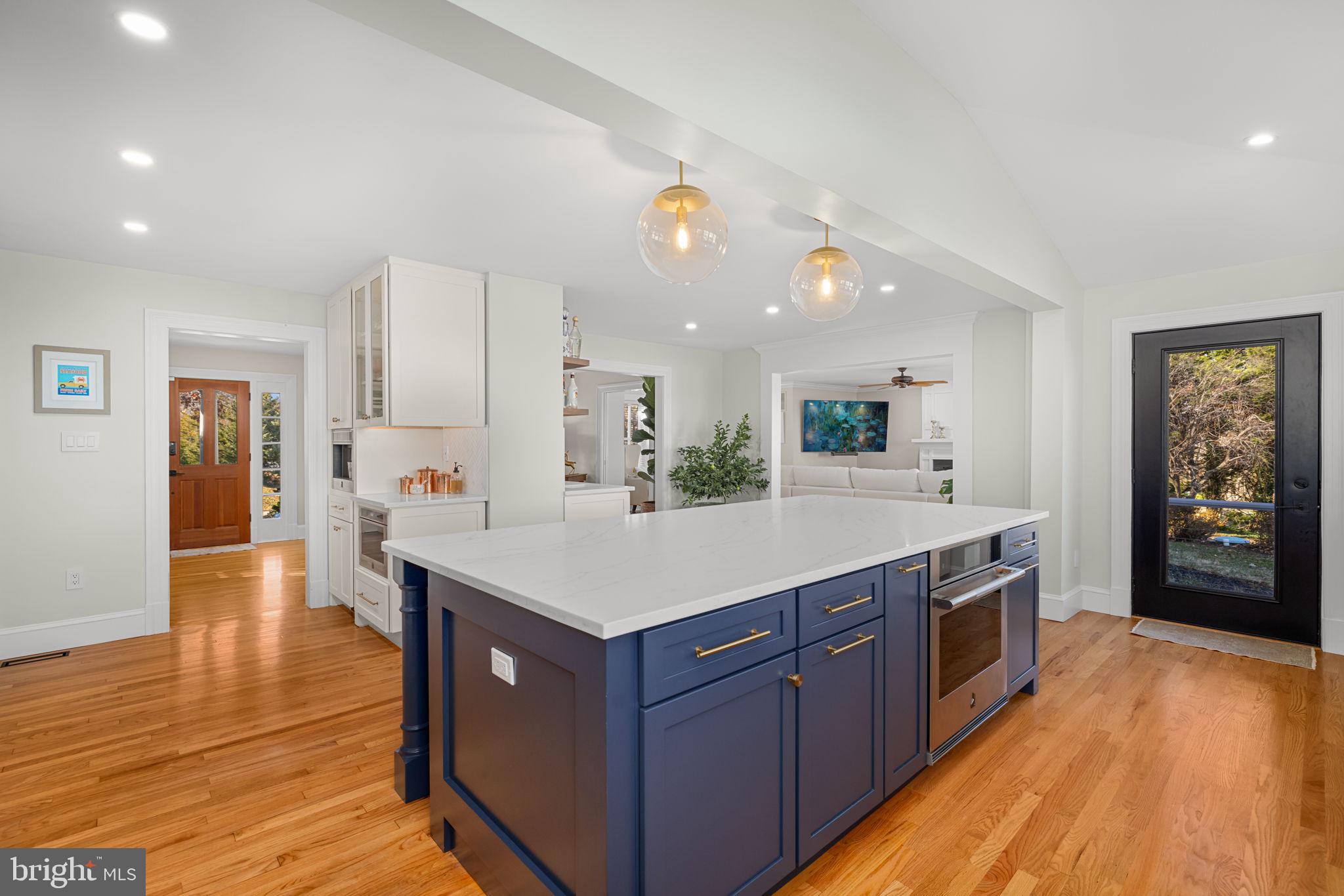 1138 Mayo Road Edgewater, MD 21037 - Photo 15 of 51 a large kitchen with stainless steel appliances a large counter top and sink