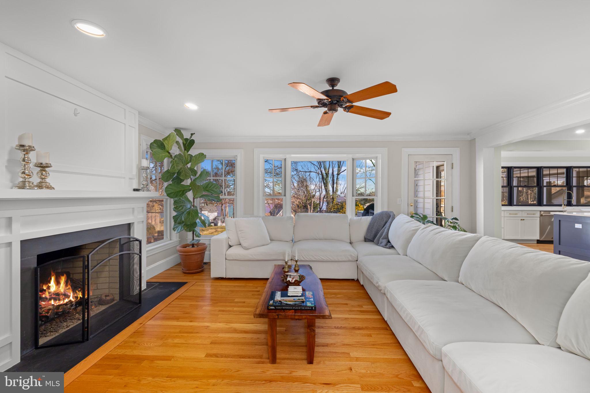 1138 Mayo Road Edgewater, MD 21037 - Photo 17 of 51 a living room with furniture and a fireplace