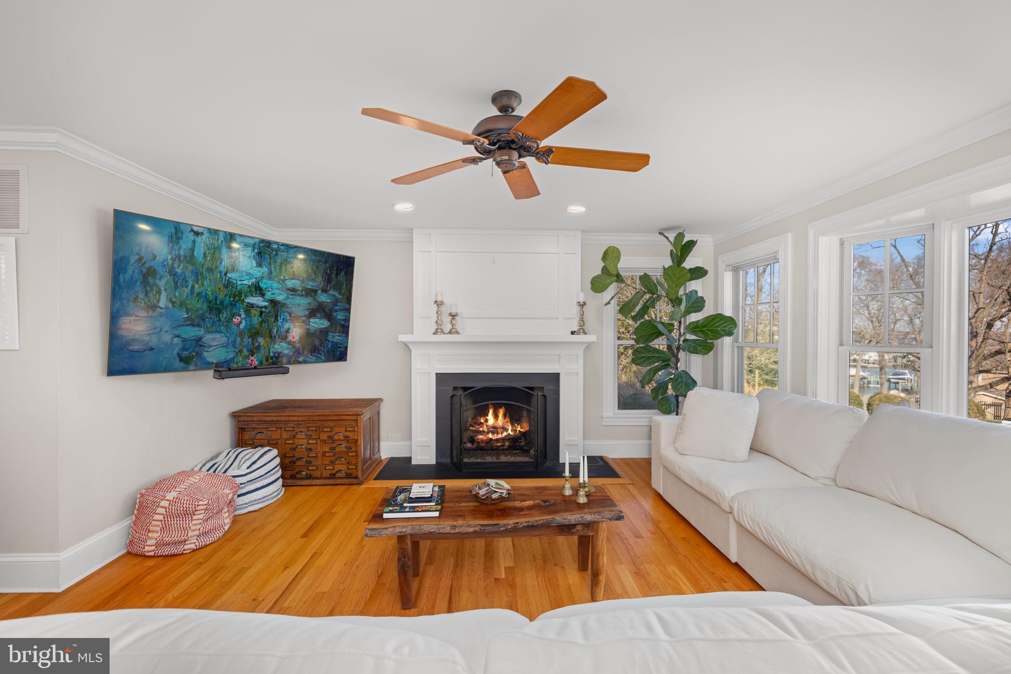 1138 Mayo Road Edgewater, MD 21037 - Photo 18 of 51 a living room with furniture and a fireplace