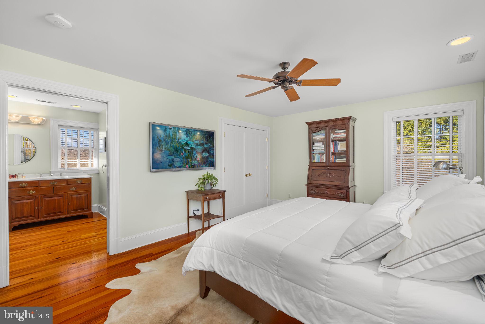 1138 Mayo Road Edgewater, MD 21037 - Photo 24 of 51 a bedroom with a bed and a view of kitchen