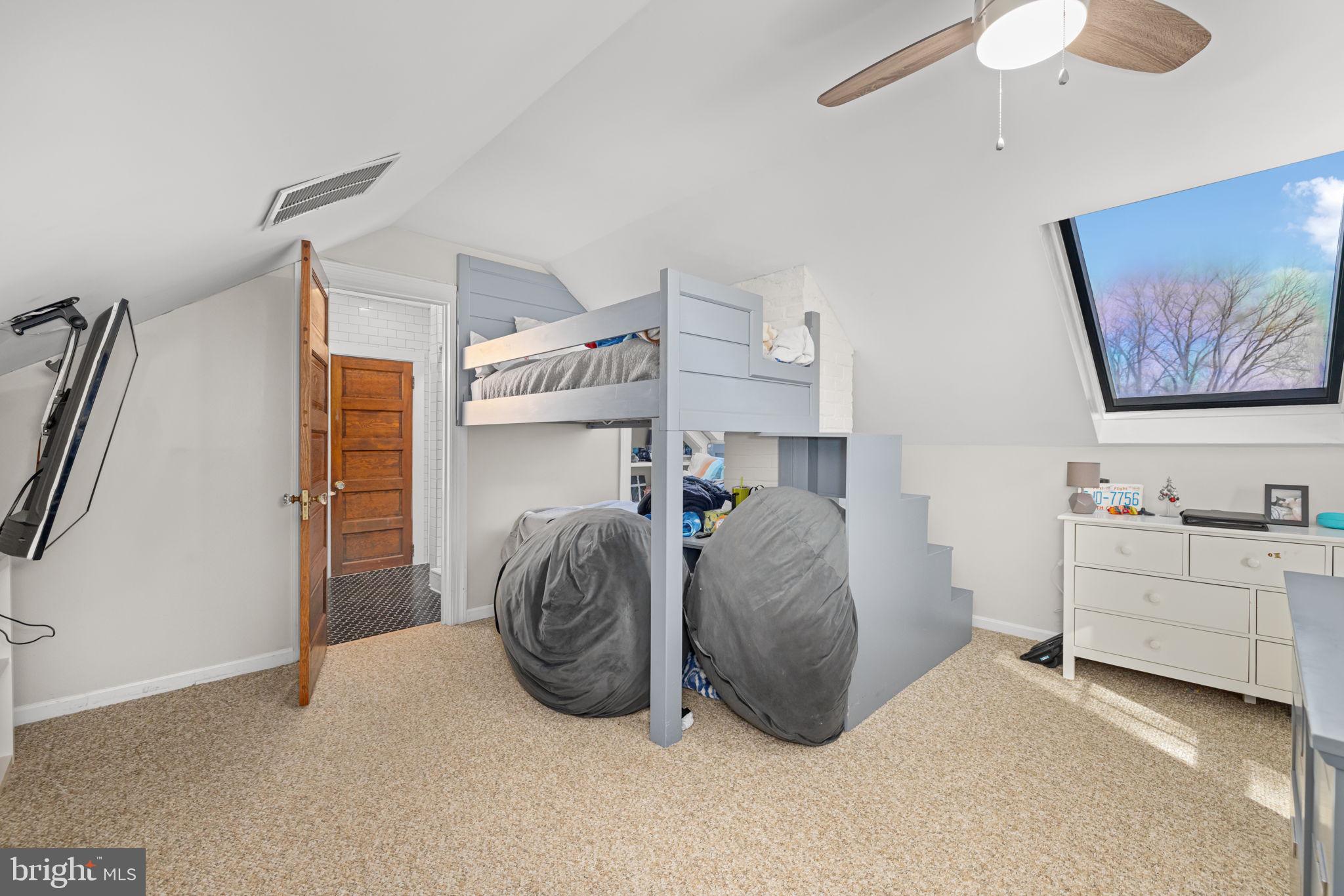 1138 Mayo Road Edgewater, MD 21037 - Photo 33 of 51 a bedroom with a bed and a painting on the wall