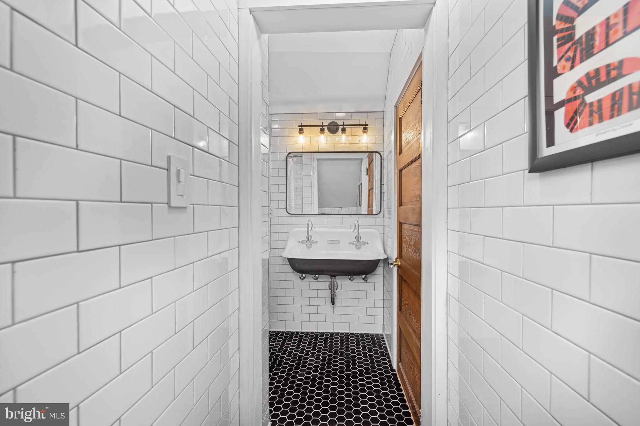 1138 Mayo Road Edgewater, MD 21037 - Photo 34 of 51 a bathroom with a toilet and a shower