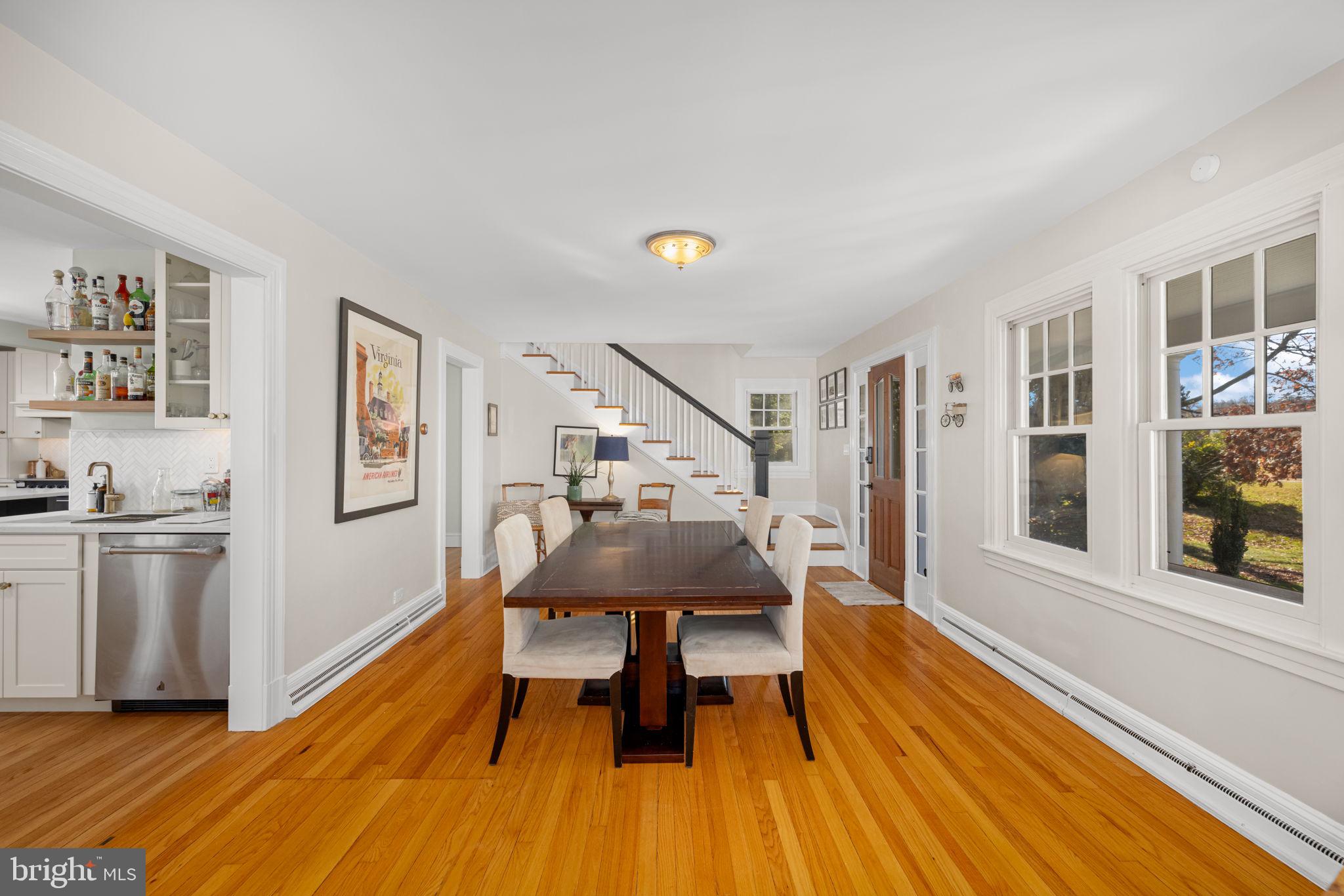 1138 Mayo Road Edgewater, MD 21037 - Photo 4 of 51 a dining room with furniture and wooden floor