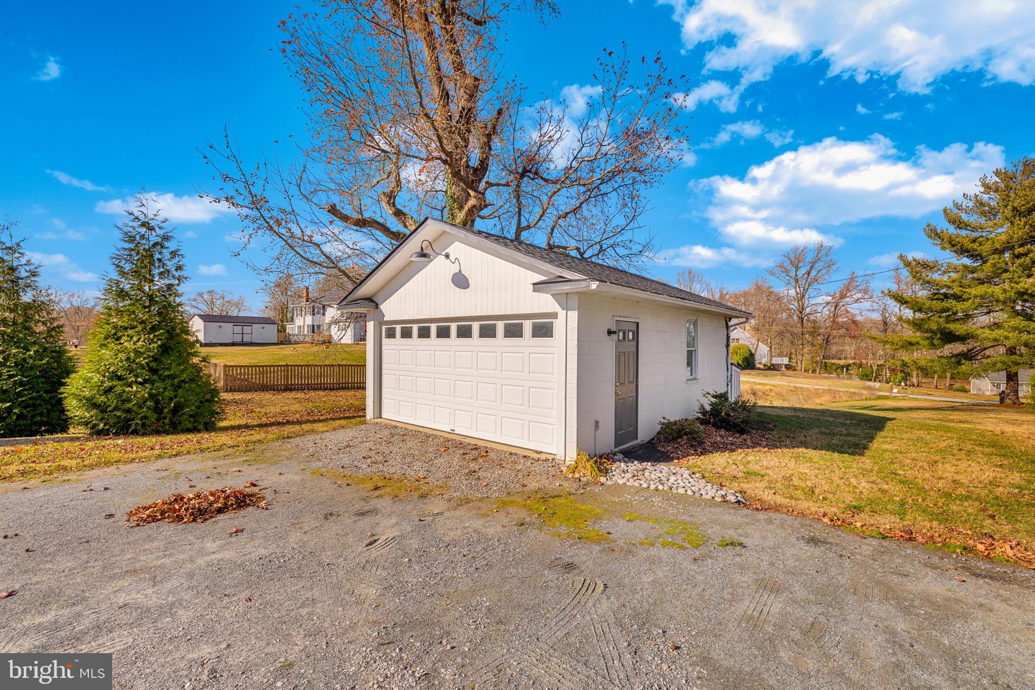 1138 Mayo Road Edgewater, MD 21037 - Photo 44 of 51 a view of a house with a yard covered in snow