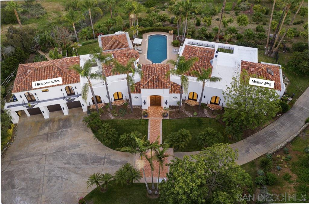 7060 Rancho Cielo Rancho Santa Fe, CA 92067 - Photo 15 of 25 an aerial view of a house with garden space and street view