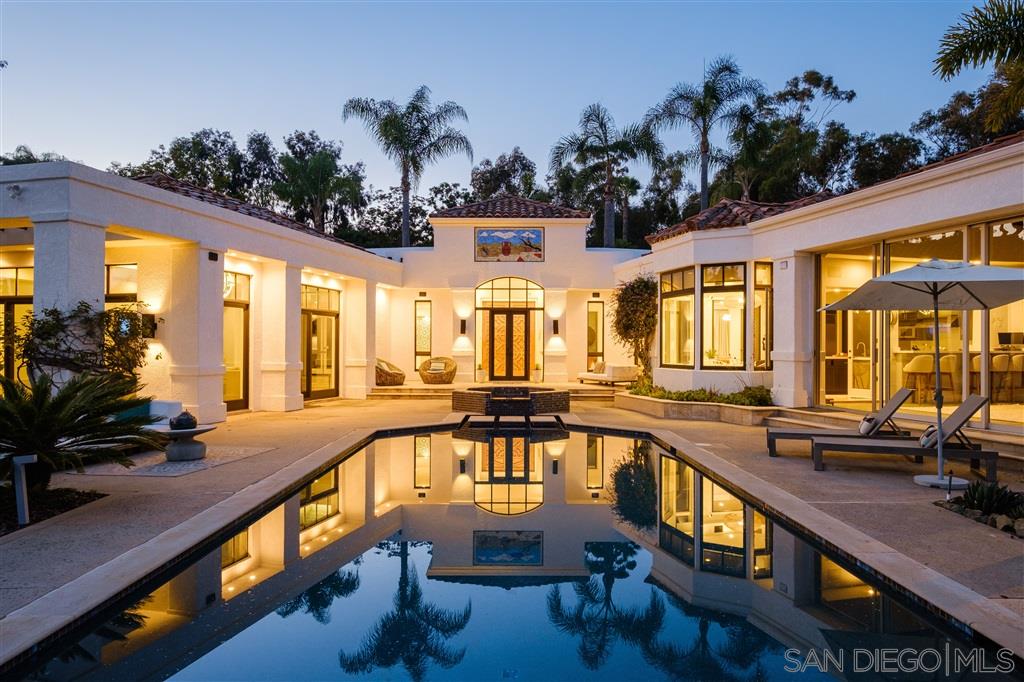 7060 Rancho Cielo Rancho Santa Fe, CA 92067 - Photo 19 of 25 a view of a swimming pool with outdoor seating